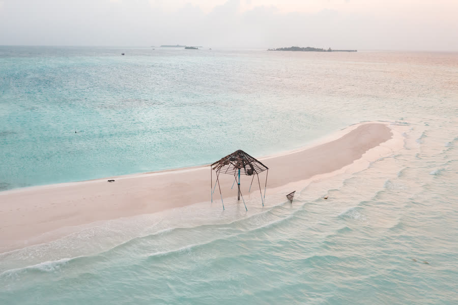 One parasol, one sandbank